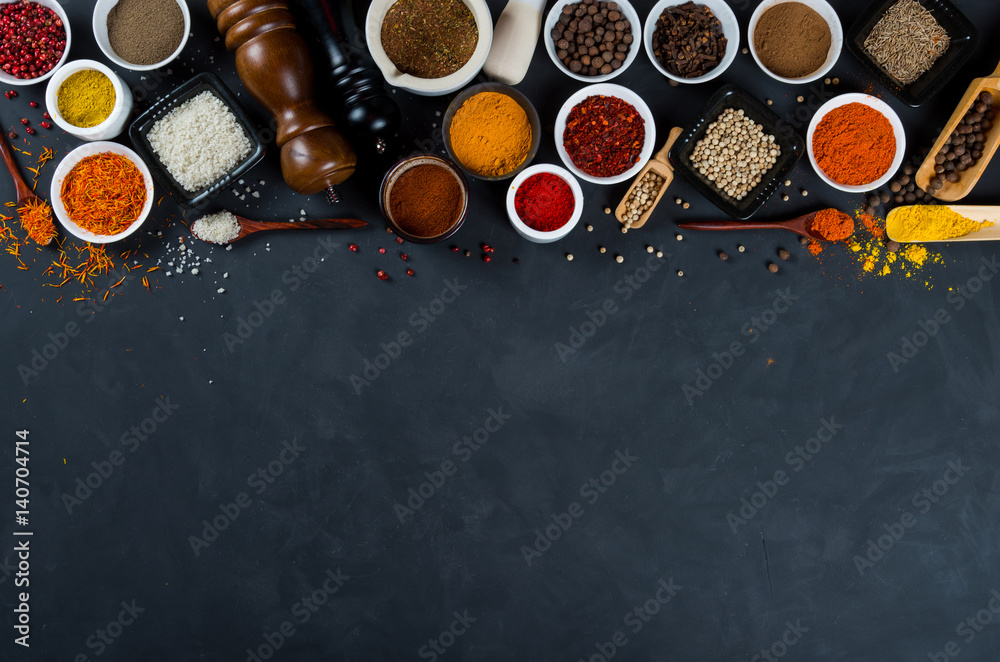 Large set of asian spices and herbs on black background Large set of asian spices and herbs on black background