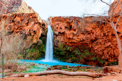  This is Havasu Falls on the Havasupai Reservation in Supai, Arizona. The falls have beautiful blue green flowing water, and this area is world famous.