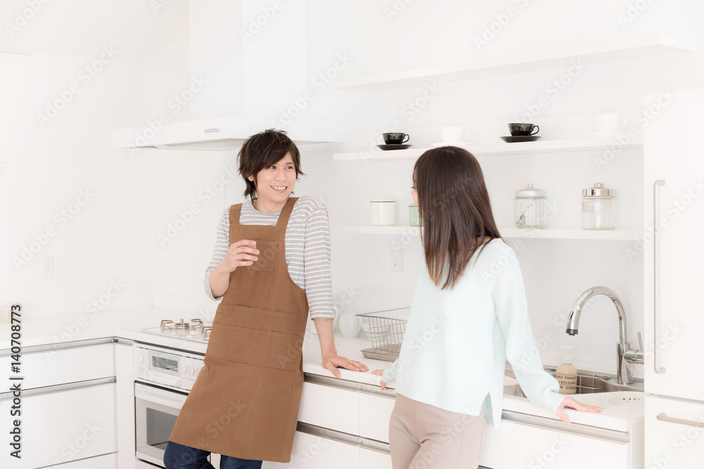 Fototapeta premium young asian couple in modern kitchen