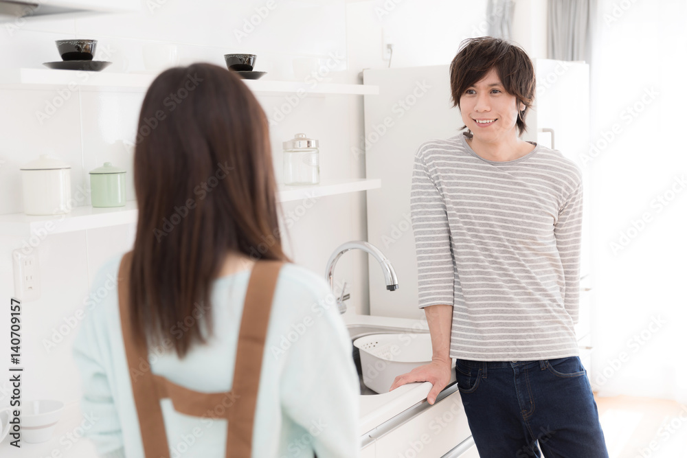 Fototapeta premium young asian couple in modern kitchen