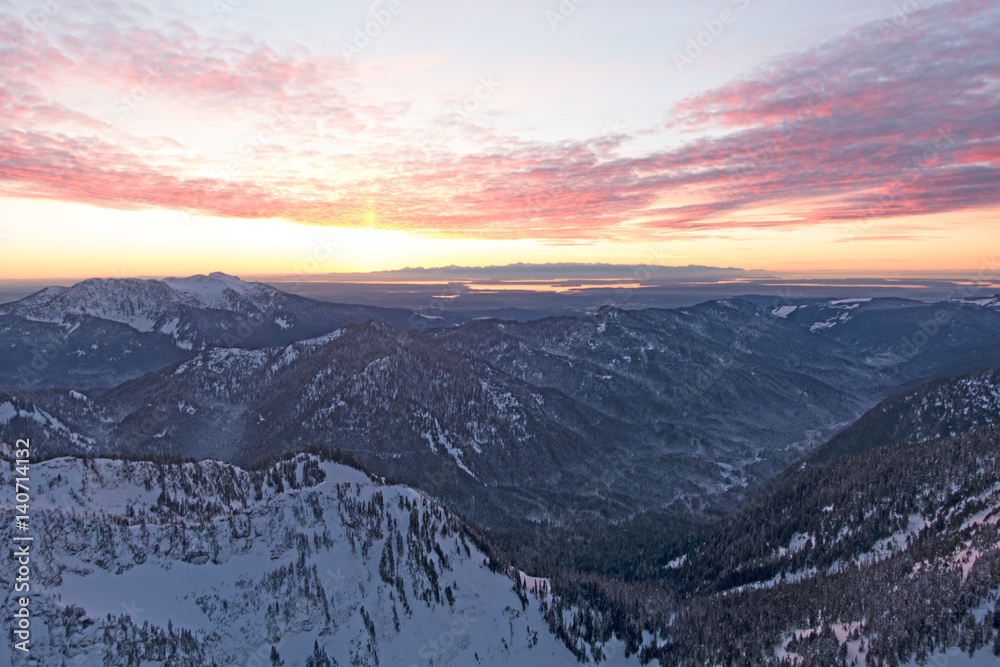 Pacific Northwest Cascade Mountains to Pacific Ocean Aerial Sunset View