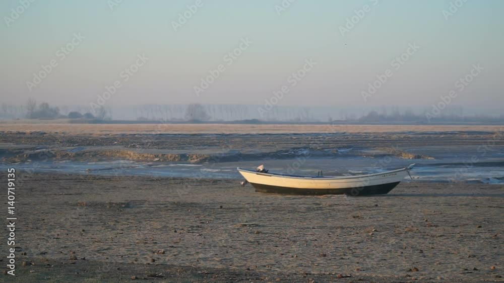 The lonely boat is aground
