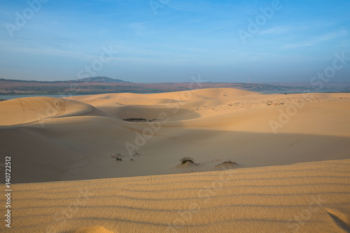 Intrepid Traveler on white sand dunes - Mui Ne  Vietnam