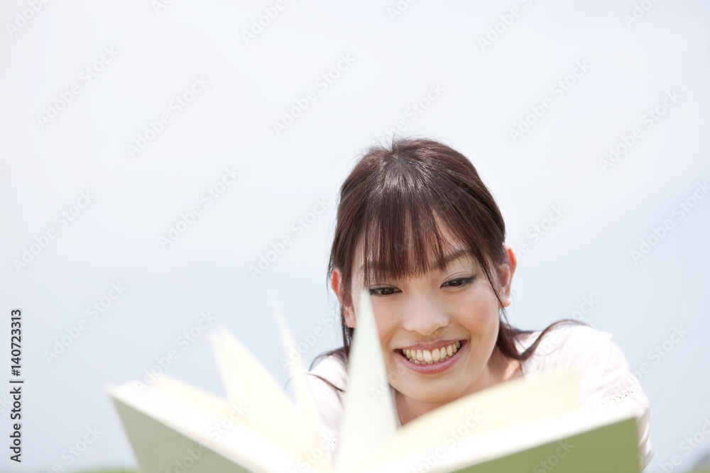 Woman reading book