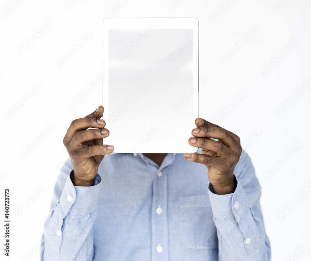 Man Face Covered with Digital Tablet Man Face Covered with Digital Tablet