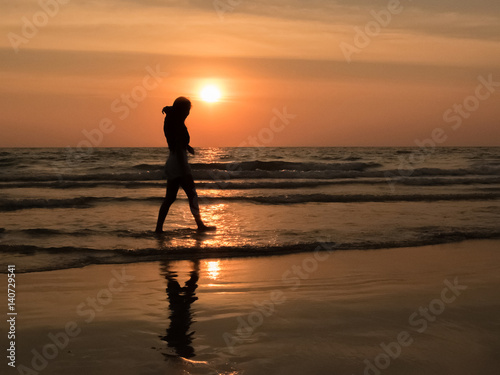 silhouette woman on the beach