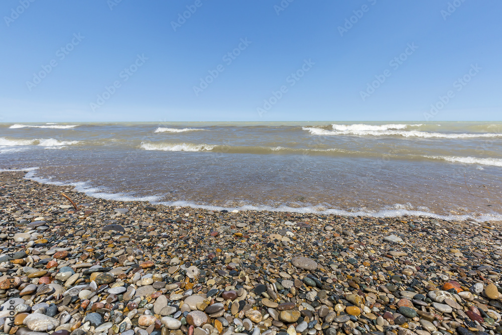 Lake Huron beach covered in pebbles - Ontario, Canada Lake Huron beach covered in pebbles - Ontario, Canada