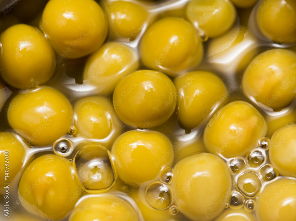 Canned green peas as a background Canned green peas as a background