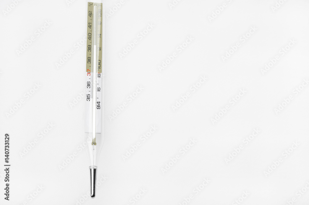 Close up of glass tube and mercury thermometers on white background take with selective color technique and art lighting Close up of glass tube and mercury thermometers on white background take with selective color technique and art lighting
