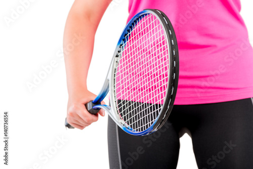 racket in the hands of the athlete close-up at the level of hips © kosmos111