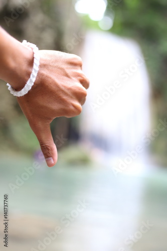 hand and Arawan water fall national park at Kanchanaburi, Thailand photo