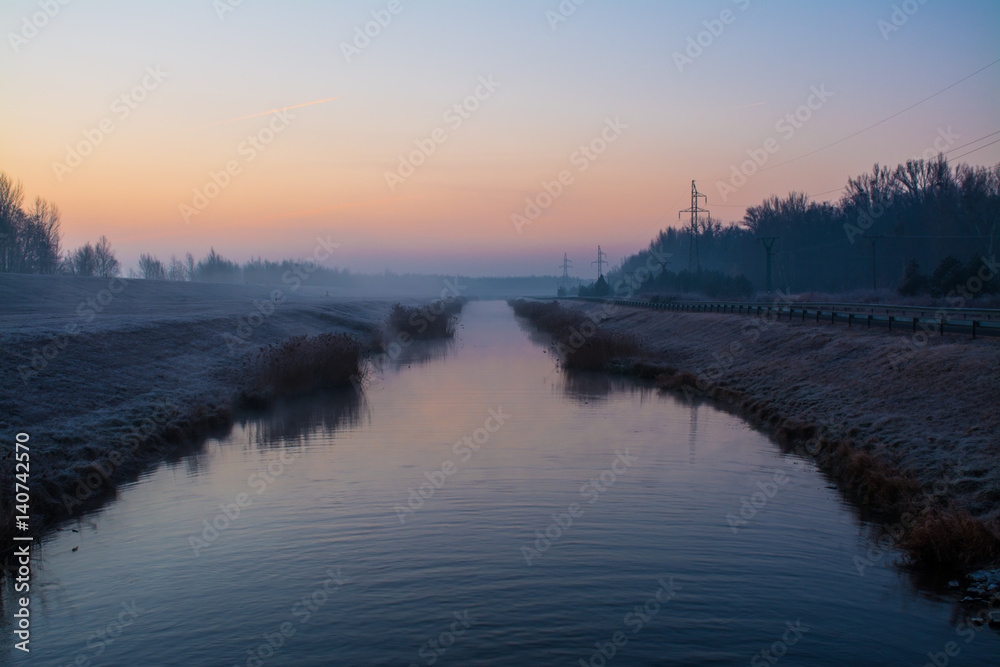Controlled water flow of the Danube River at sunrise