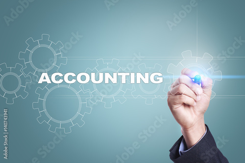 Businessman drawing on virtual screen. accounting concept.