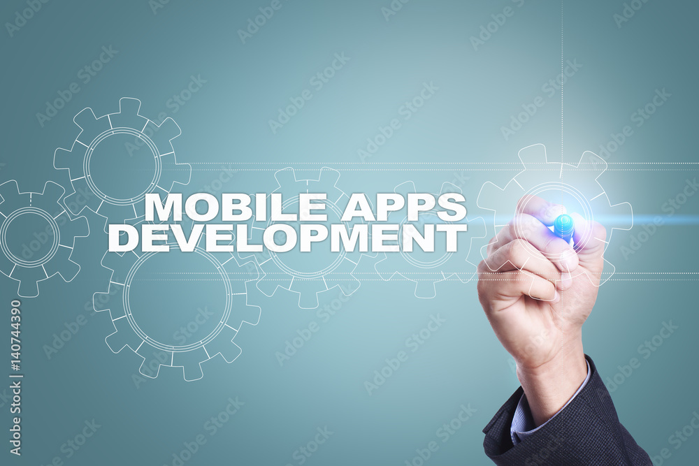 Businessman drawing on virtual screen. mobile apps development concept. Businessman drawing on virtual screen. mobile apps development concept.