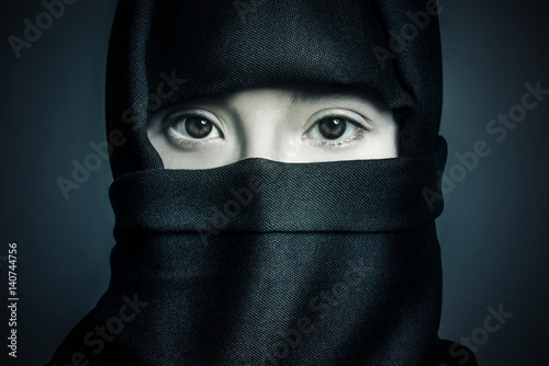 Eyes of muslim girl in black hijab