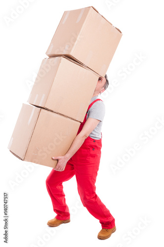 Guy lifting or holding bunch of heavy cardboard boxes