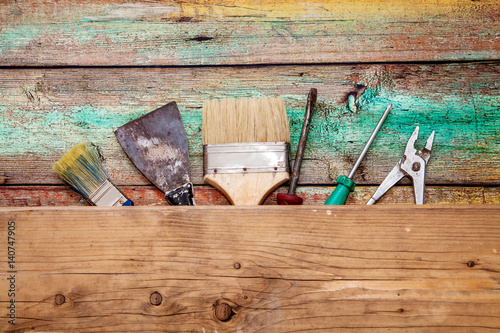 Tools on wooden background with copy space