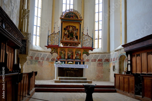 Inside the old medieval saxon lutheran church in Sighisoara, Transylvania, Romania photo