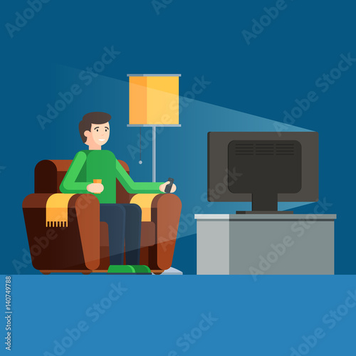 Man watches TV on sofa with coffee cup