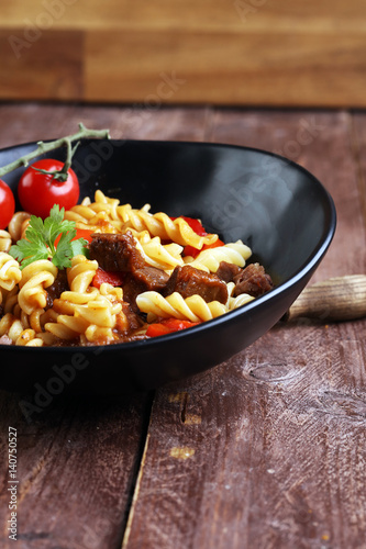 beef goulash, a stew that originated in Hungary, served with noo