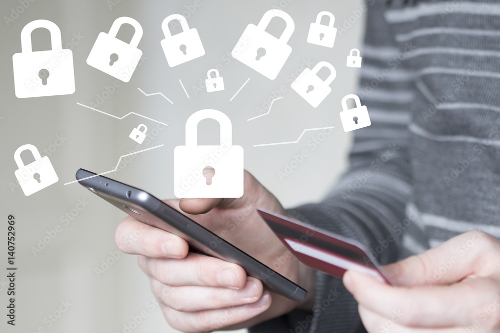 Businessman on phone confirms lock security purchase credit card Businessman on phone confirms lock security purchase credit card