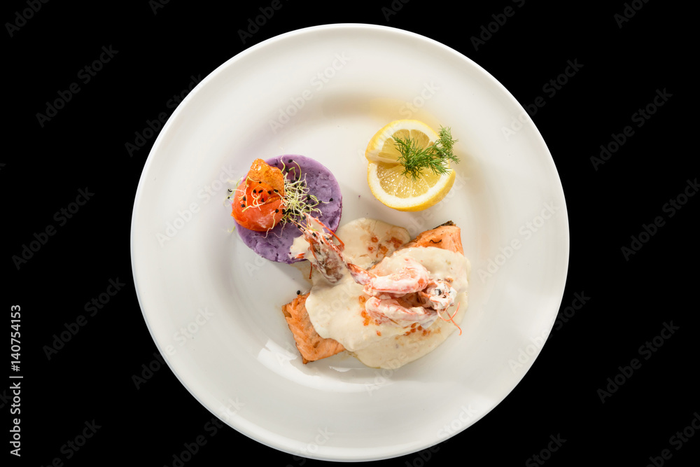 salmon fillet with champagne sauce and purple potatoes