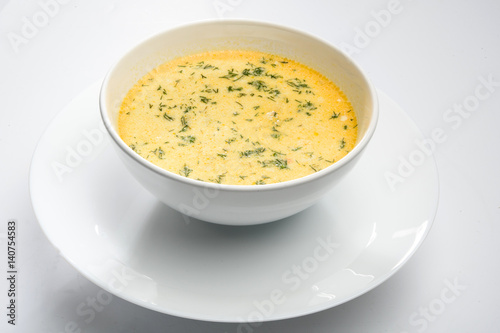 Tripe soup in a white bowl