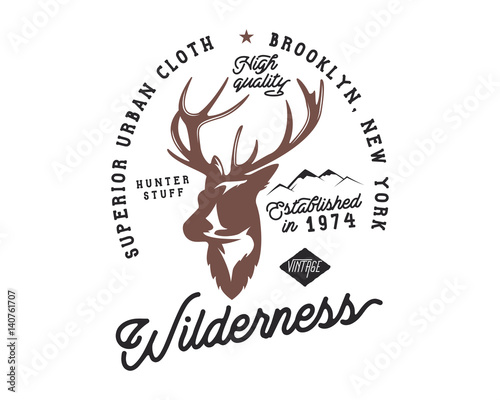 Hand drawn vintage camping badge and hiking label with hiking design elements and typography. Included deer head, mountains and quote text- "wilderness". Old style patch. Rustic stamp vector template.