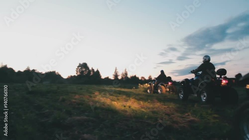 Wallpaper Mural Boys team ATV going away in the forest at night Torontodigital.ca