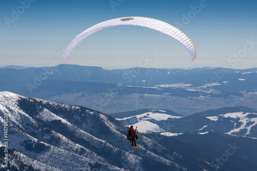 paragliding on skis, winter holiday activity, Chopok, Slovakia