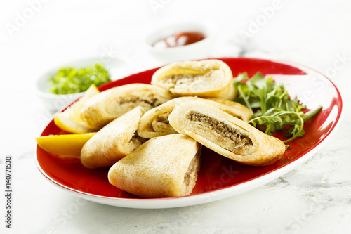 Pancakes, stuffed with meat