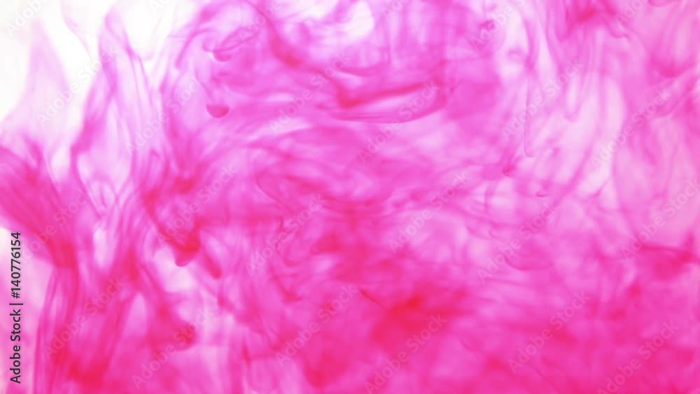 Red ink dissolves in clear water Red ink dissolves in clear water