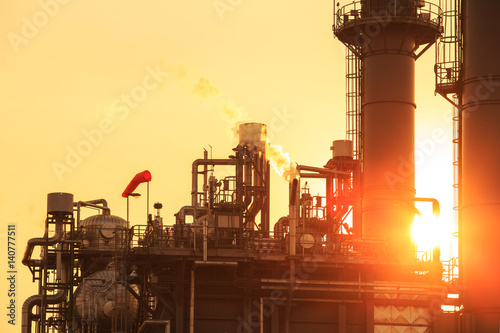 Silhouette and Petrochemical industrial plant power station at sunset and ,view,Amata City Industrial Thailand.



