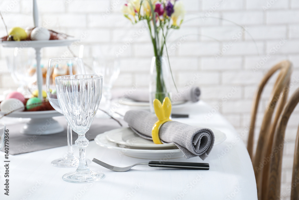 Beautiful Easter table setting in light room Beautiful Easter table setting in light room