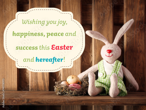 Easter bunny with eggs on w...