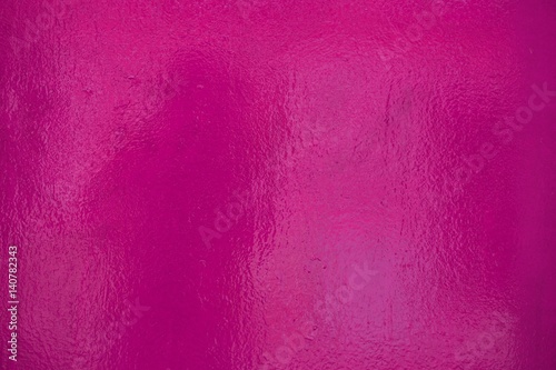 Błyszcząca powierzchnia farby w kolorze różowym