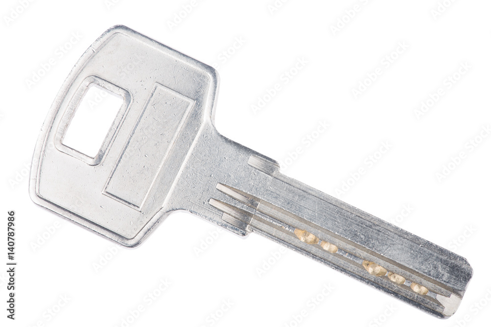 steel key on white steel key on white
