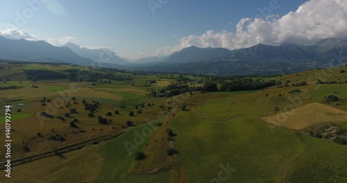 Aerial freedom fields alps summer mountains 