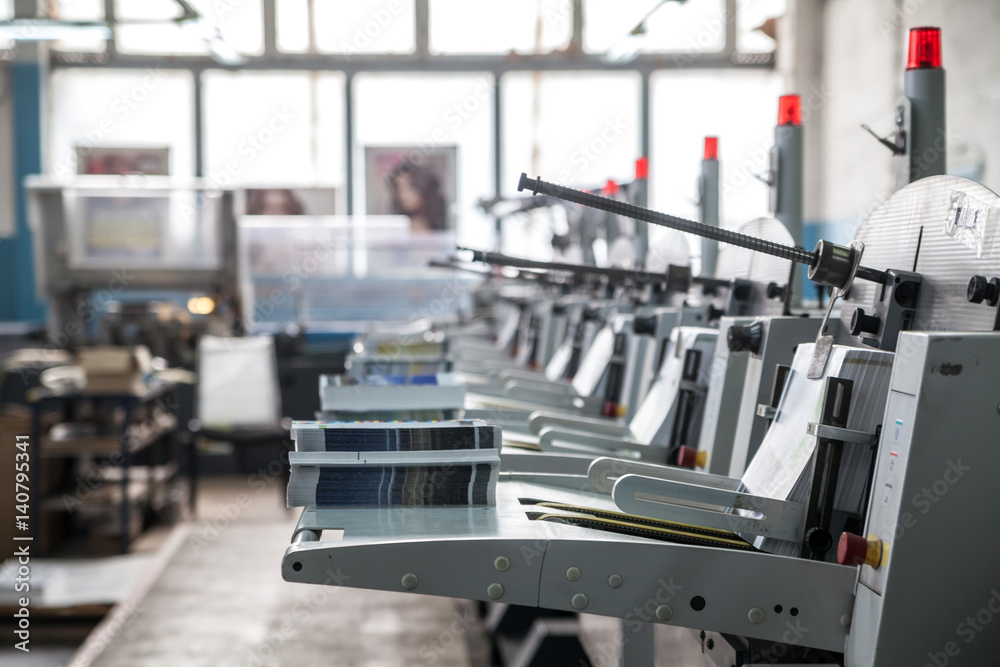 Fototapeta premium stitching and trimming line in the printing-house
