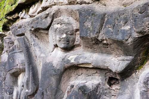 Yeh Pulu stone carving close-up, Ubud, Bali, Indonesia photo