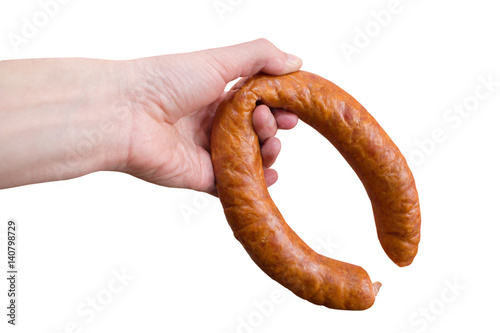 hands holding sausage