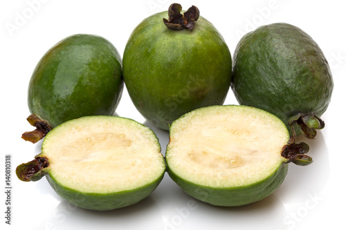 Four feijoa on white