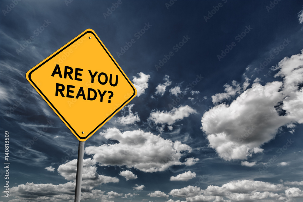 Dark blue cloudy sky and yellow road sign Dark blue cloudy sky and yellow road sign
