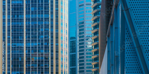 Modern blue glass buildings in the downtown of Bangkok  Phloen Chit area . Commercial corporate architecture