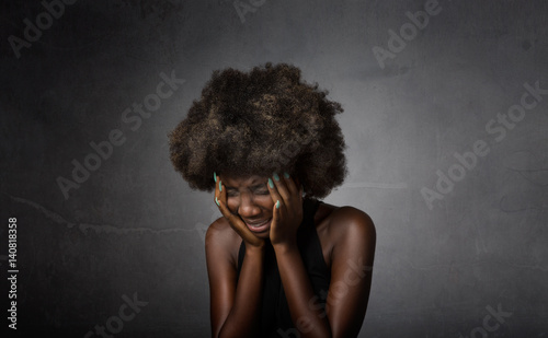 african girl crying