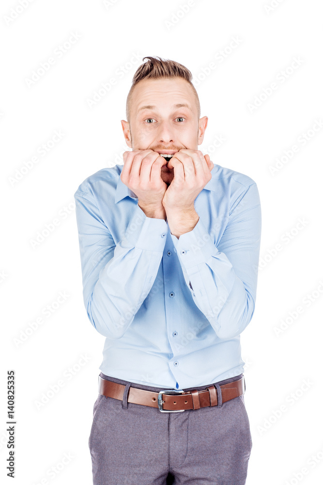 business man biting his nails fingers freaking out. human emotion expression and lifestyle concept. image on a white studio background.. business man biting his nails fingers freaking out. human emotion expression and lifestyle concept. image on a white studio background..
