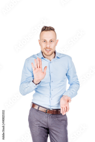 businessman making stop sign with hand. emotions and people concept. © kaninstudio