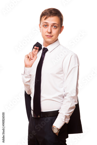 Young handsome businessman is holding a jacket in his one hand and the other hand in his pocket. portrait isolated on white background