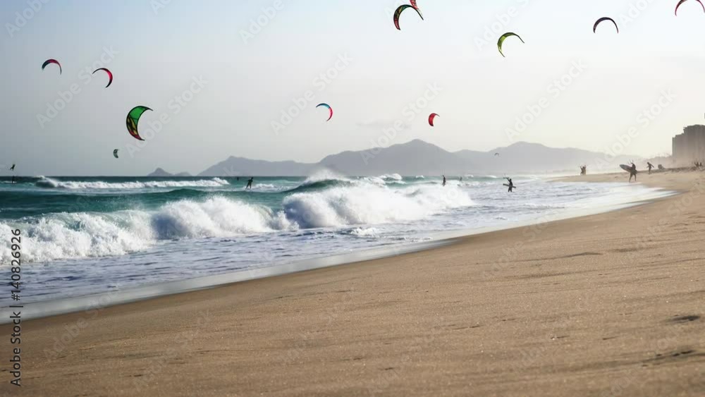 Kitesurfers on the waves near the Barra in Rio