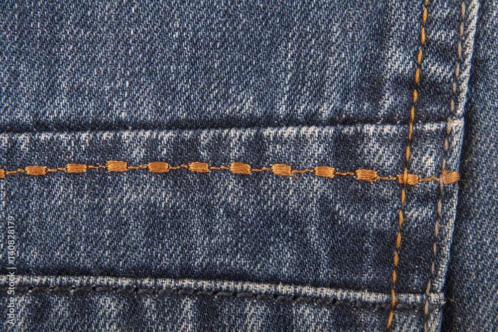 Orange stitch on jeans